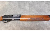 REMINGTON ARMS CO ~ MODEL 1100 ~ 16 GAUGE - 7 of 8