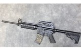 BUSHMASTER ~ XM15-E2S ~ 5.56X45MM NATO - 2 of 9