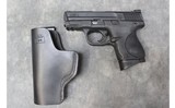 SMITH & WESSON ~ M&P 9C W/LASER ~ 9MM LUGER - 1 of 3