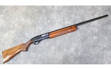 REMINGTON ARMS CO. ~ MODEL 1100 ~ 20 GAUGE - 1 of 8