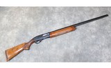 REMINGTON ARMS CO ~ MODEL 1100 ~ 12 GAUGE - 1 of 8