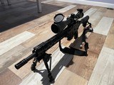 Custom build AR 15 with UTG 3 12x 44 scope