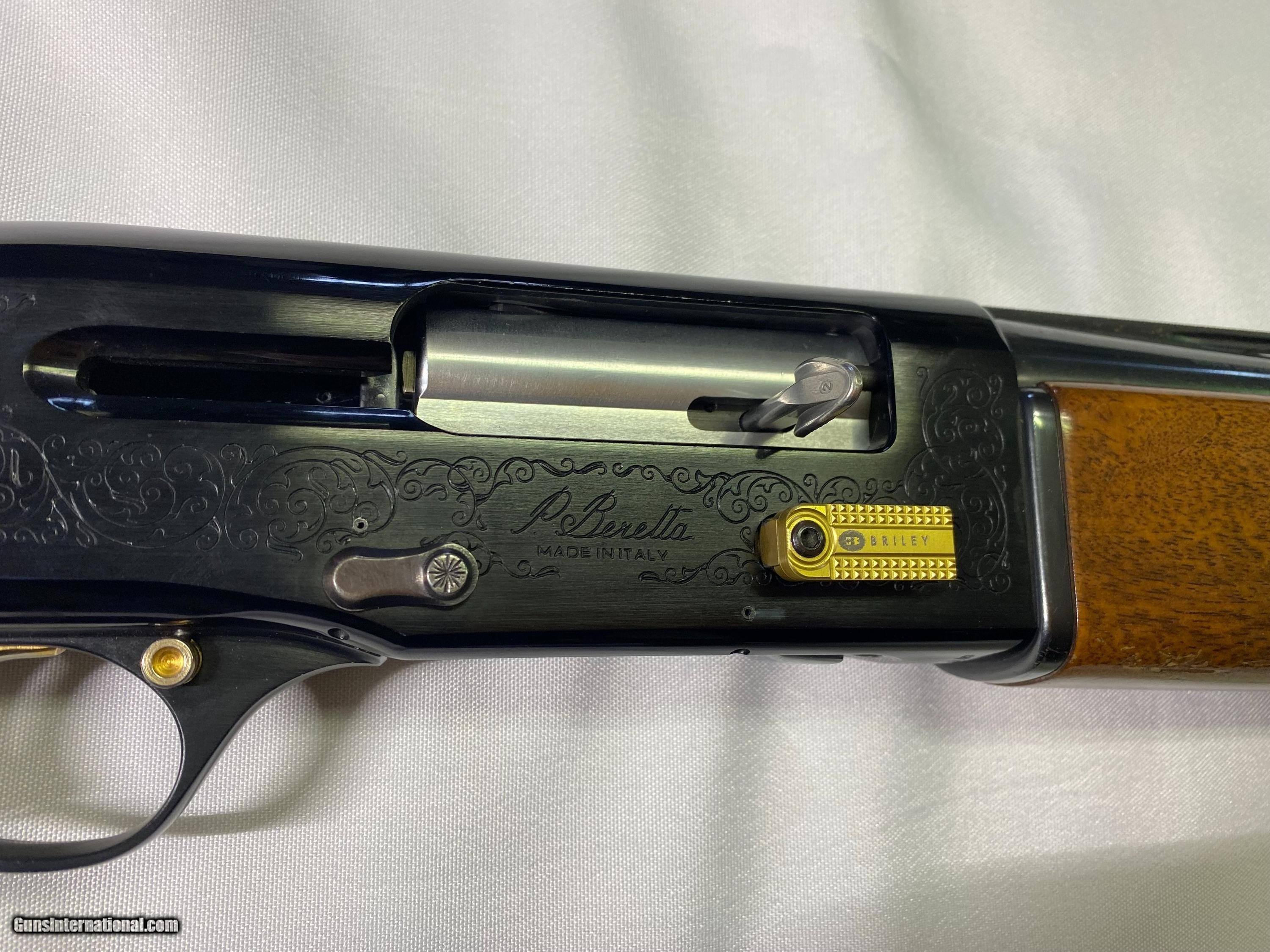 Beretta 12 gauge Model A-302, gold accents & 4 chokes