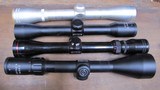 Simmons lot of four scopes, Simmons model 21012, Simmons 4x32 22 Mag, Simmons 4x32 model 1033, Simmons 3-9x50 8 Point.