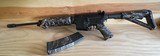 .223 and 5.56 chambered Bushmaster xm15 e2s AR15 rifle with skull design - 1 of 4
