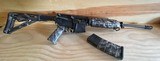 .223 and 5.56 chambered Bushmaster xm15 e2s AR15 rifle with skull design - 2 of 4