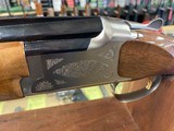 Browning Citori 16 gauge with gold trigger and 28 inch barrel with modified and improved cylinder chokes. - 8 of 10