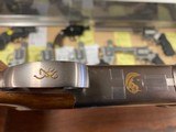 Browning Citori 16 gauge with gold trigger and 28 inch barrel with modified and improved cylinder chokes. - 9 of 10