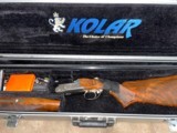 Kolar sporting clays 32” flat rib sporter with adjustable comb 16 chokes . 750 bore - 1 of 14