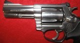 SMITH & WESSON MODEL 60-4 STAINLESS 3" WITH ADJUSTABLE SIGHTS - 5 of 10