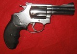 SMITH & WESSON MODEL 60-4 STAINLESS 3" WITH ADJUSTABLE SIGHTS - 2 of 10