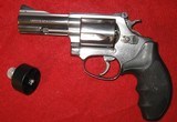 SMITH & WESSON MODEL 60-4 STAINLESS 3" WITH ADJUSTABLE SIGHTS - 1 of 10