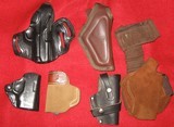 6 USED HOLSTER PACKAGE - 1 of 14