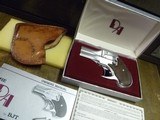 BTJ DERRINGER DA, American Derringer Company, 38sp,
Unfired with clear warranty card and paperwork/box - 2 of 2