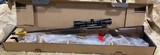Mossberg Patriot Walnut Vortex Scope Blued Bolt Action - 338 Winchester Magnum - Black/Wood - 1 of 6