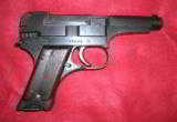 T-94 Nambu pistol 20.1 date - 2 of 4