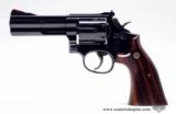 Smith & Wesson Model 586-3
4 inch .357 Mag. U.S. Customs Bi-Centennial Revolover In Presentation Case. 1 0f 610 - 5 of 7