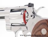Colt Python 'ELITE' .357 Mag. 6 inch
Bright Stainless Finish.
Like New. In Matching Blue Hard Case. - 7 of 8