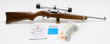 Ruger Model 10/22 22LR Carbine with Stainless Steel Barrel And Silver Scope - 1 of 9
