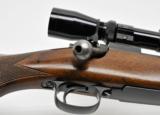 Winchester Pre-64 Model 70 Featherweight. 243 Win. DOM 1957. With Leupold VX-1 2-7 33mm Scope. Excellent - 10 of 11
