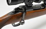 Winchester Pre-64 Model 70 Featherweight. 30-06 Win. DOM 1959. With Leupold M8 6X42 Scope. Very Good - 6 of 10