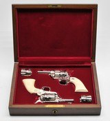 2 Colt SAA Sheriff's Model. 44/40. 3 Inch. Engraved Nickel Finish. Rare Consecutive Pair. Excellent Condition. In Colt Wood Case. - 1 of 13