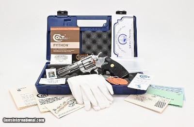 Colt Python 357 Mag. 4 Inch Satin Stainless. Like New Condition. In Hard Case. DOM 1987