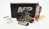 Smith & Wesson Model M&P Shield 40. .40 S&W. Black/Tan Cerakote. Excellent In Box - 1 of 6