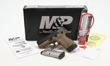 Smith & Wesson Model M&P Sheild 40. .40 S&W. Black/Tan Cerakote. Excellent In Box