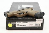 Smith & Wesson Model M&P Shield 40. .40 S&W. Black/Tan Cerakote. Excellent In Box - 3 of 6