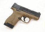 Smith & Wesson Model M&P Shield 40. .40 S&W. Black/Tan Cerakote. Excellent In Box - 4 of 6