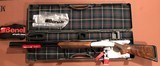 Benelli 828u Nickel Engraved 12 gauge - 1 of 12
