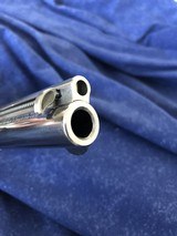 Ruger New Vaquero - .45 Colt - High Gloss Stainless - 4 1/2" barrel - Box, Manual, shell test - Excellent Condition - 14 of 15