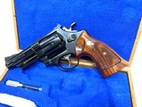 Excellent condition 4" Smith & Wesson Model 57 With Original carboard sleeve and display case 41 Mag - 4 of 15