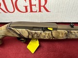 New in Box Ruger 10-22 Bronze Cerakote, synthetic stock Camo, Iron sights, Carbine model. ** No Credit Card Fees** - 1 of 4