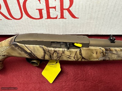 New in Box Ruger 10-22 Bronze Cerakote, synthetic stock Camo, Iron sights, Carbine model. ** No Credit Card Fees**