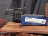 SMITH & WESSON 380 CALIBER WITH LASER SIGHT - 1 of 2