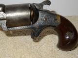 Moore’s Pat. Fire Arms Co. Front Loading .32 Caliber Teat-Fire Single Action Revolver
- 9 of 22