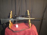 REMINGTON MODEL 7 CALIBER 223 REM WITH REDFIELD SCOPE 3 TO 9 POWER - 1 of 2