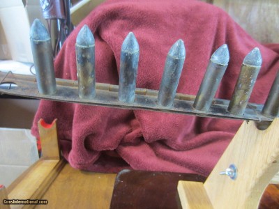.56 CALIBER BILLINGHURST REQUA BATTERY LOADED IN PIANO HINGED WITH 24 CARTRIDGES