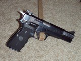 Browning Hi Power 9mm w/Laser Grip - 1 of 3