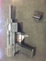 INTRAC ARMS INTERNATIONAL INC. tec-22 - 1 of 4