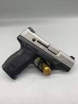 TAURUS PT 140 PRO MILLENIUM - 1 of 4