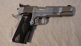 SPRINGFIELD ARMORY 1911A1 Stainless w/Crimson Trace Laser - 1 of 7