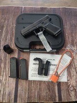 GLOCK 19m g19m fbi with Ameriglow night sights (Remanufactured) - 1 of 6