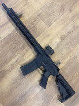 ROCK RIVER ARMS lar-15
with sig Romeo5 red dot magpul flip up sights - 1 of 7
