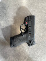 SMITH & WESSON 9mm M&P9 SHIELD M2.0 thumb safety with crimson trace laser - 1 of 2
