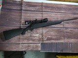 SAVAGE ARMS Axis 6.5 Creedmoor w/ Bushnell 3x-9x.40 Scope - 1 of 7
