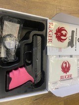 RUGER Security - 9 with Pink hogue grip - 1 of 7