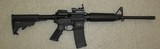 SMITH & WESSON ar15 M&P 15 with a red dot sight and a forward grip 10rd or 30rd magazine - 1 of 2